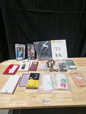 EL427// lot de différents accessoires pour téléphones, table…