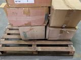 a pile of boxes sitting on a pallet in a warehouse