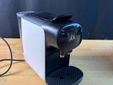 a coffee machine that is sitting on a table