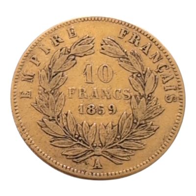 un gros plan d'une pièce de monnaie ornée d'une couronne