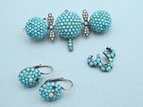 three pairs of turquoise beaded earrings and a pair of earrings