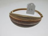 two tone gold and silver bang bracelets with a price tag