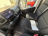 a picture of a car that is sitting in the back of a truck