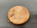 a brown object that is sitting on a table