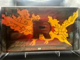 an image of a cd case with a picture of the letter r on it