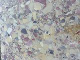 a large slab of marble sitting on the ground
