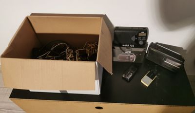 a box with a camera and other electronics on a table