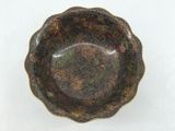 a small bowl with a floral design on it