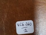 brown leather chair with a label on the back of it
