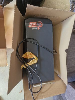 a box with a power supply in it sitting on the floor