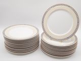 many plates stacked on top of each other on a table
