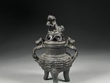 an old silverware with a bird on top of it