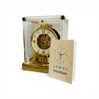 JAEGER-LECOULTRE ATMOS AT 3 Horloge en métal doré et plexigl…