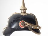 a black helmet with a red and white emblem on it