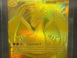 a close up of a pokemon card in a plastic case