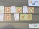 la photo d'une vitrine contenant des timbres