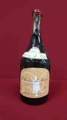 a bottle of wine that is sitting on a table