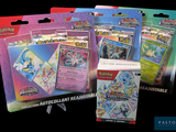 quatre paquets de cartes à collectionner Pokémon sur fond noir