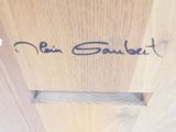 a close up of a wooden door with writing on it