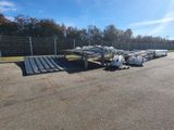 a lot of boats that are sitting in the parking lot