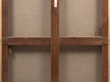a close up of a wooden frame with a window on it