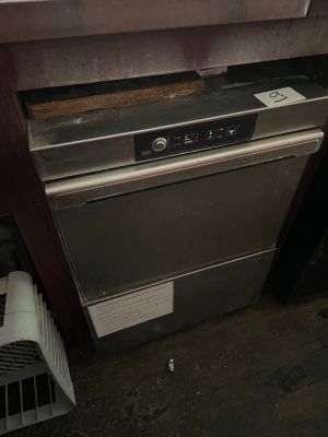 an oven that is sitting in the kitchen with the door open