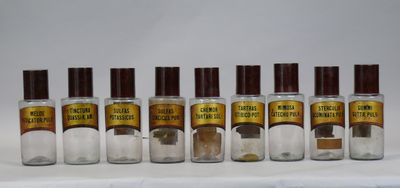 six bottles of different types of perfume are lined up on a table