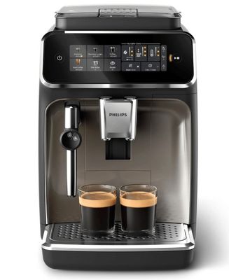 a close up of a coffee machine with two cups of coffee