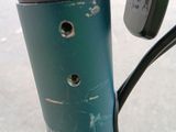 a close up of a bike handle on the street