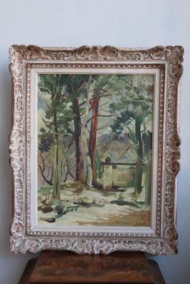 an image of a painting of a forest scene in a frame