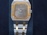 a watch that is sitting on a display stand
