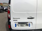 a white van that is parked in a parking lot