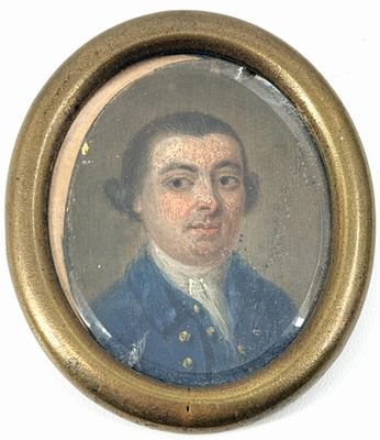 portrait d'un homme en manteau bleu dans un cadre doré