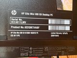 a label on the back of a laptop that says hp elite mini