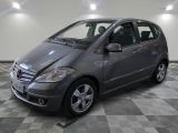 a picture of a mercedes b - class parked in a garage