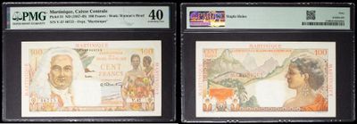three different types of currency are on display in a display case