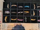 a display case filled with different types of bracelets