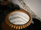 a mirror that is sitting on top of a table