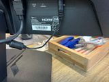 a picture of a computer monitor with a cable attached to it