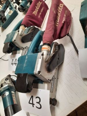 many different types of power tools on a table