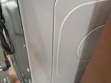a white washer and dryer sitting in a room