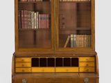 an image of a wooden desk with a book case