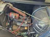 a small engine in the trunk of a car