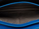 the inside of a blue handbag with a zipper on it
