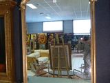 a large mirror in the middle of a room