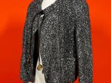 a black and white jacket on a mannequin mannequin mannequin mannequin mannequin mannequin mannequin mannequin mann