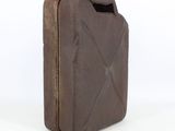 a brown plastic container with a handle on a white surface