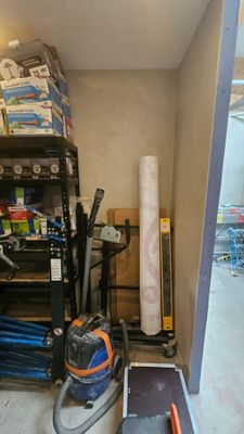an image of a garage with a lot of tools on it