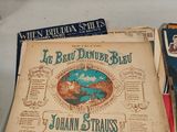 a lot of old books on the table together