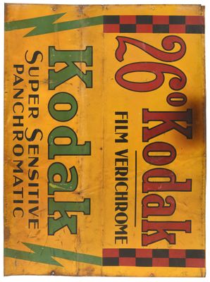 an old wooden sign with a red, green and yellow design on it